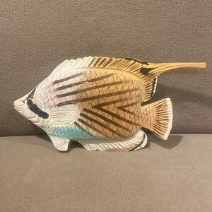 Hand carved wooden fish about 6 in long white, brown,blue colors amazing detail